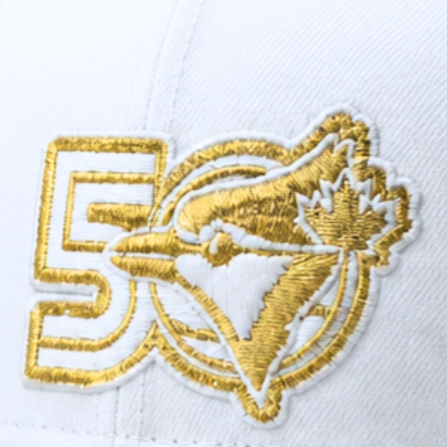 NEW ERA 9FIFTY MLB TORONTO BLUE JAYS 50TH ANNIVERSARY WHITE/GOLD SNAPBACK HAT