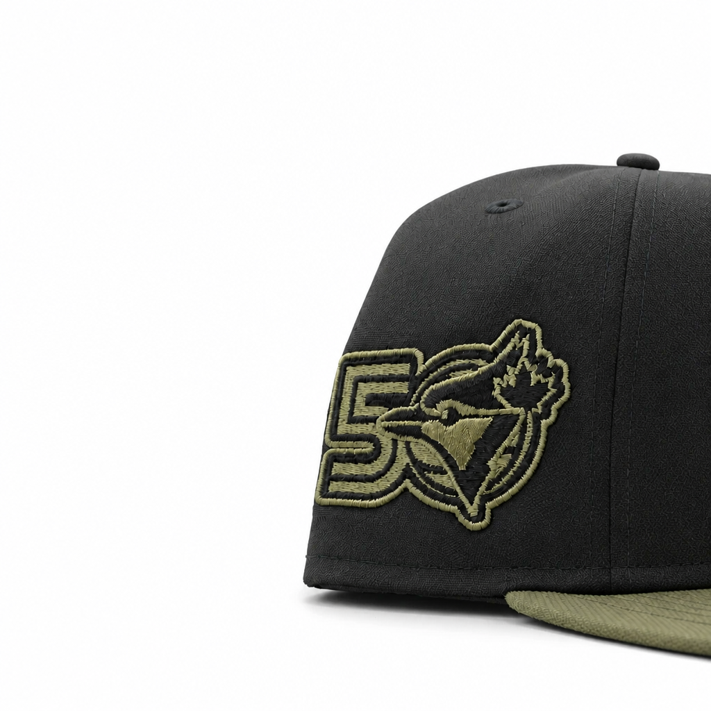 MEN'S NEW ERA MLB CAMO BLACK & OLIVE GREEN TORONTO BLUE JAYS 50TH SEASON PATCH 9FIFTY SNAPBACK HAT