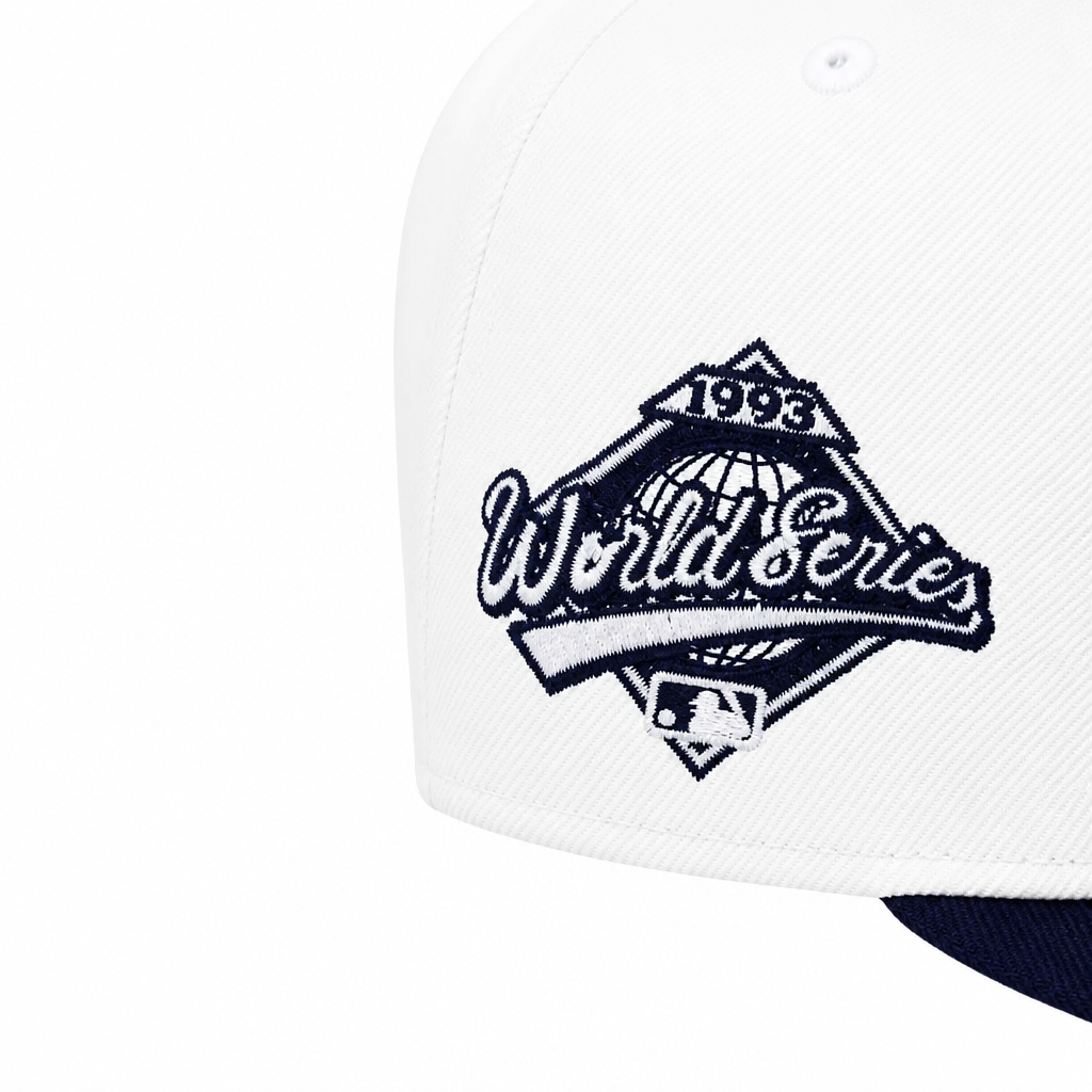 NEW ERA 9FIFTY MLB 1993 WORLD SERIES TORONTO BLUE JAYS OFF WHITE & CHROME NAVY SNAPBACK HAT