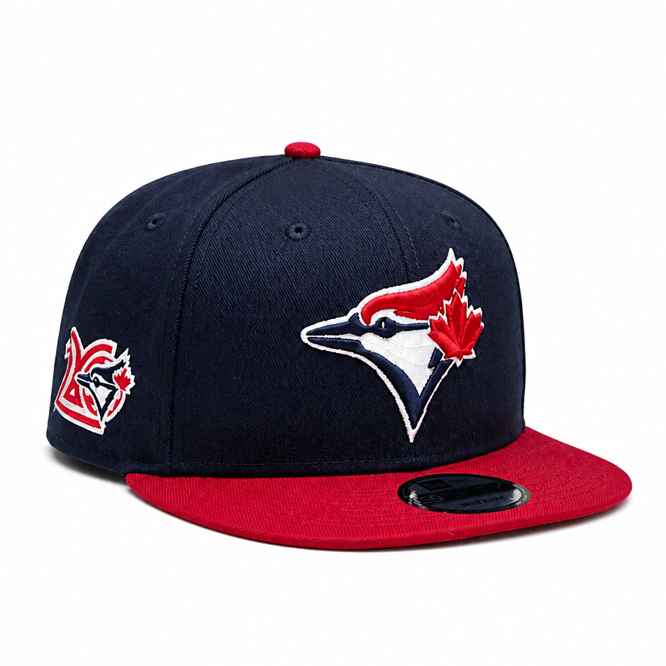 NEW ERA 9FIFTY MLB TORONTO BLUE JAYS 20TH ANNIVERSARY NAVY BLUE & SCARLET RED SNAPBACK HAT