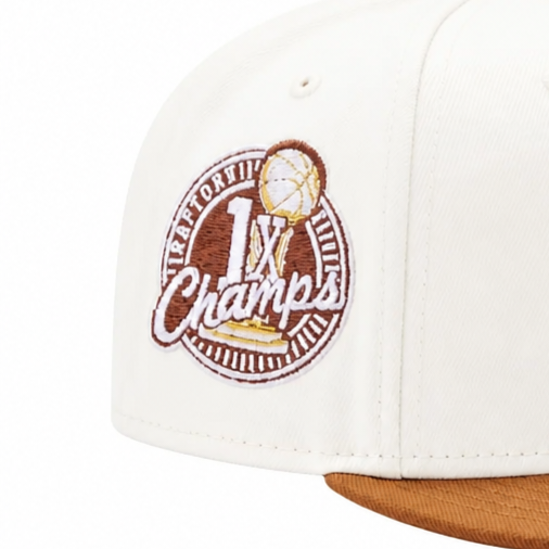 NEW ERA 9FIFTY NBA TORONTO RAPTORS 1X CHAMPS CREAM/BROWN SNAPBACK HAT
