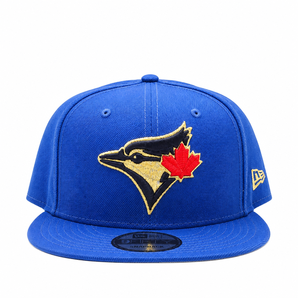 NEW ERA 9FIFTY TORONTO BLUE JAYS ROYAL BLUE/GOLD SNAPBACK HAT