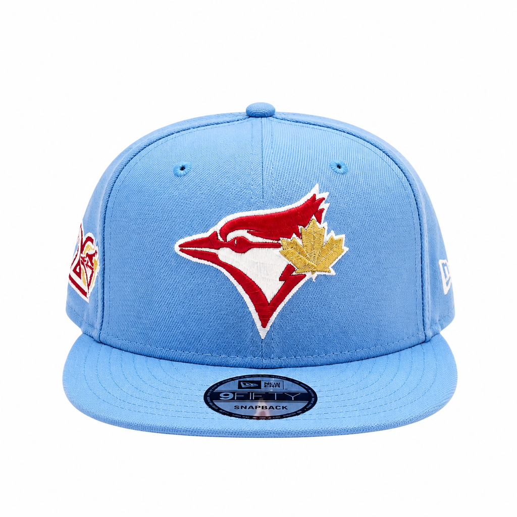 NEW ERA 9FIFTY TORONTO BLUE JAYS 20TH ANNIVERSARY SKY BLUE/RED SNAPBACK HAT