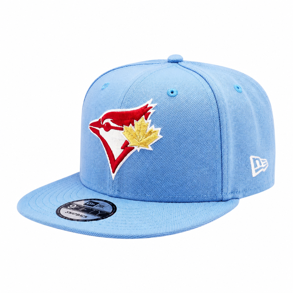 NEW ERA 9FIFTY TORONTO BLUE JAYS 20TH ANNIVERSARY SKY BLUE/RED SNAPBACK HAT