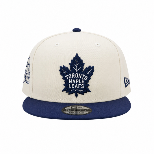 NEW ERA 9FIFTY NHL 75 FOREVER TORONTO MAPLE LEAFS CREAM/NAVY SNAPBACK HAT