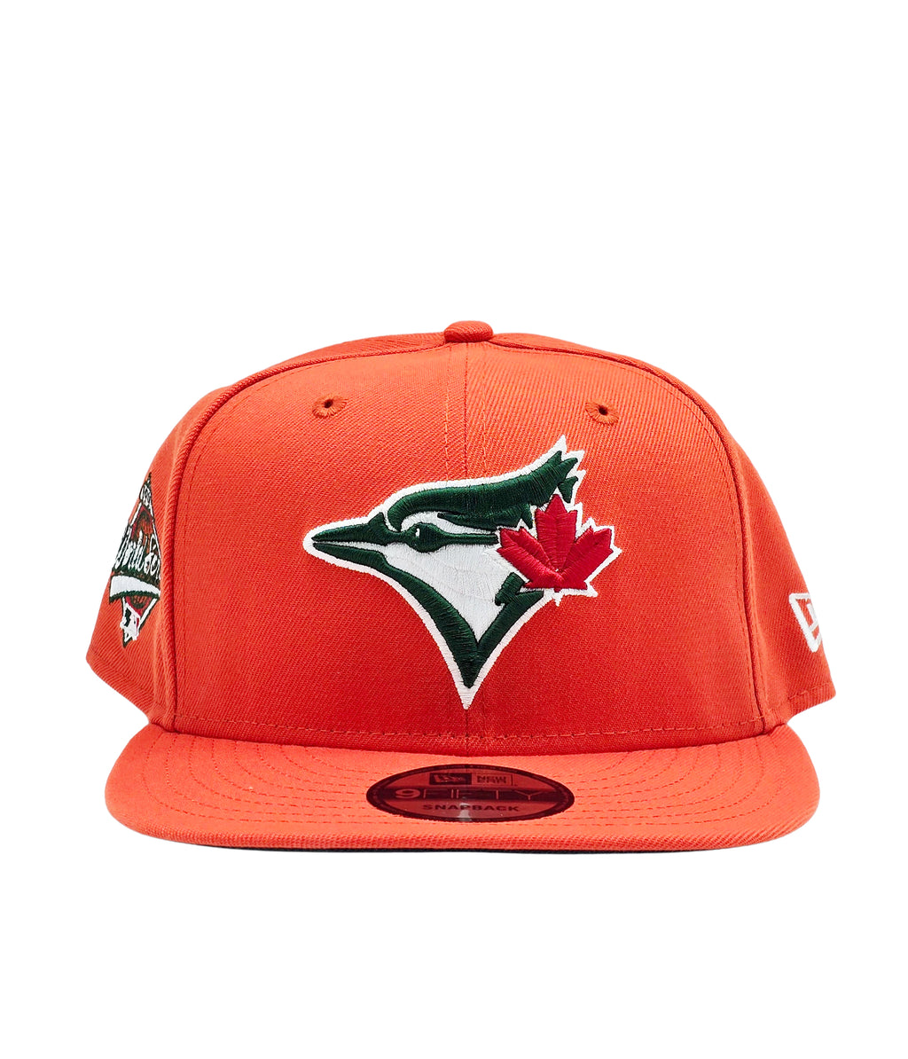 NEW ERA 9FIFTY TORONTO BLUE JAYS 1993 WORLD SERIES EDITION ORANGE/GREEN SNAPBACK HAT