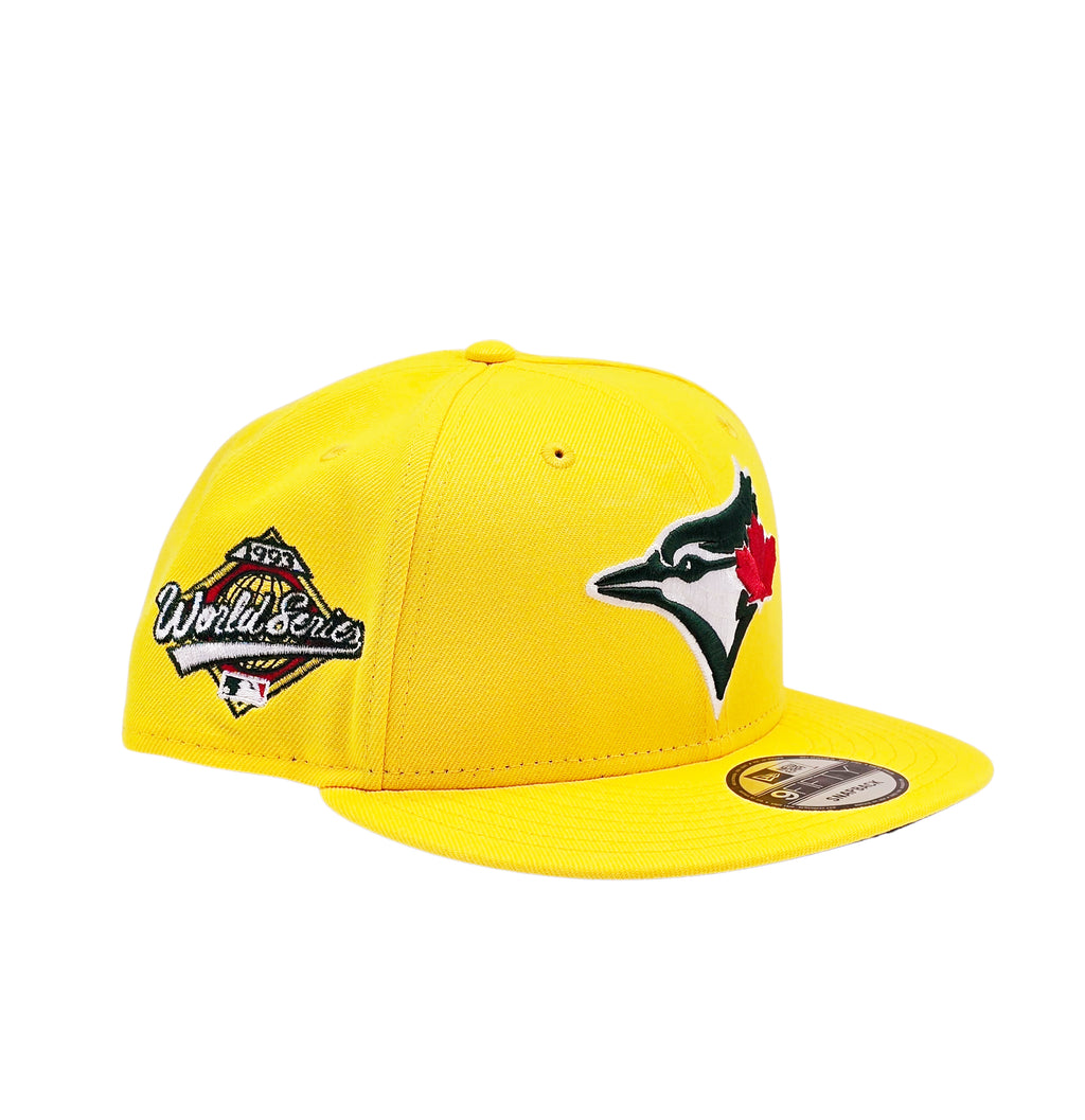 NEW ERA 9FIFTY TORONTO BLUE JAYS 1993 WORLD SERIES EDITION YELLOW/GREEN SNAPBACK HAT