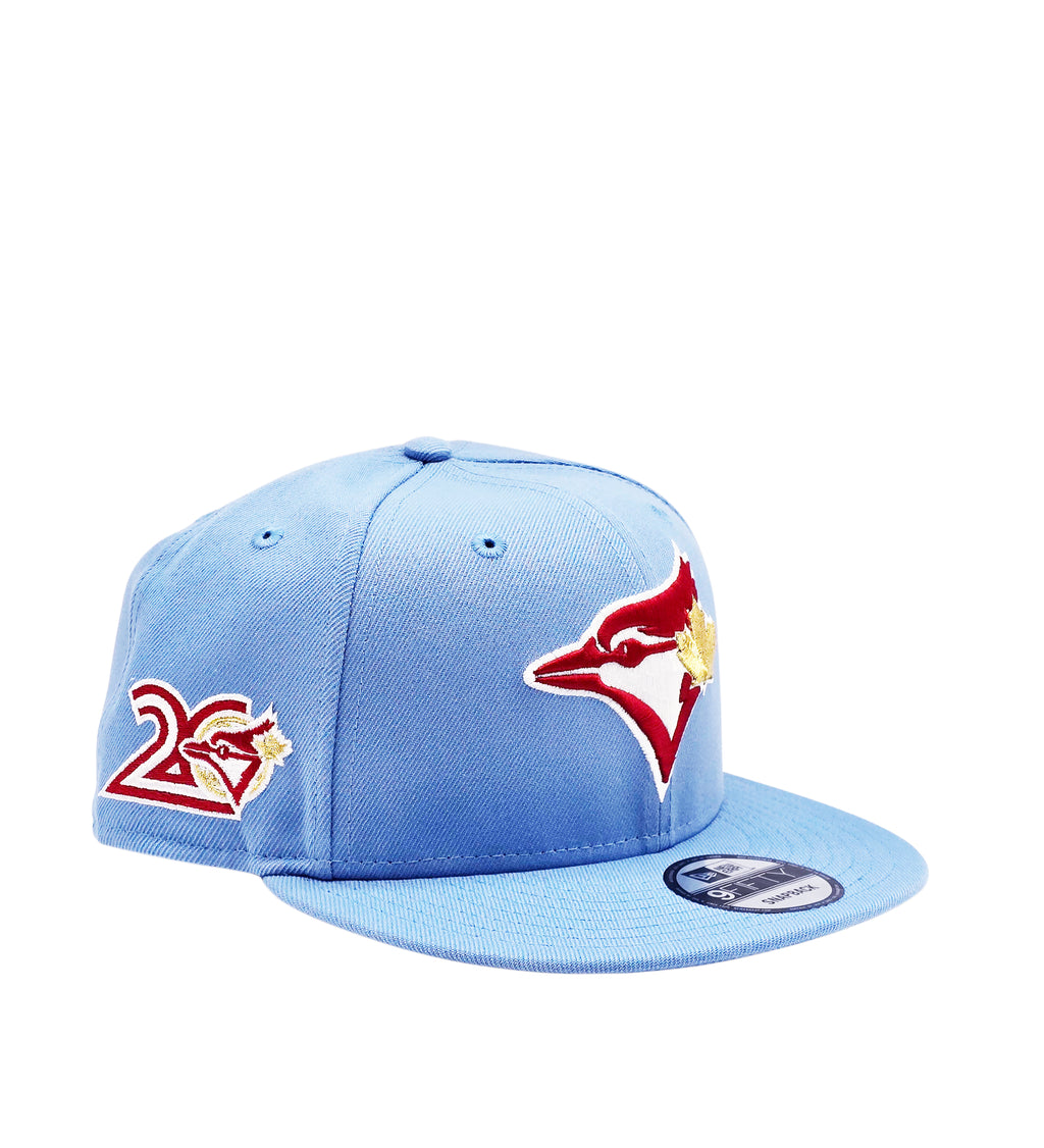 NEW ERA 9FIFTY TORONTO BLUE JAYS 20TH ANNIVERSARY SKY BLUE/RED SNAPBACK HAT