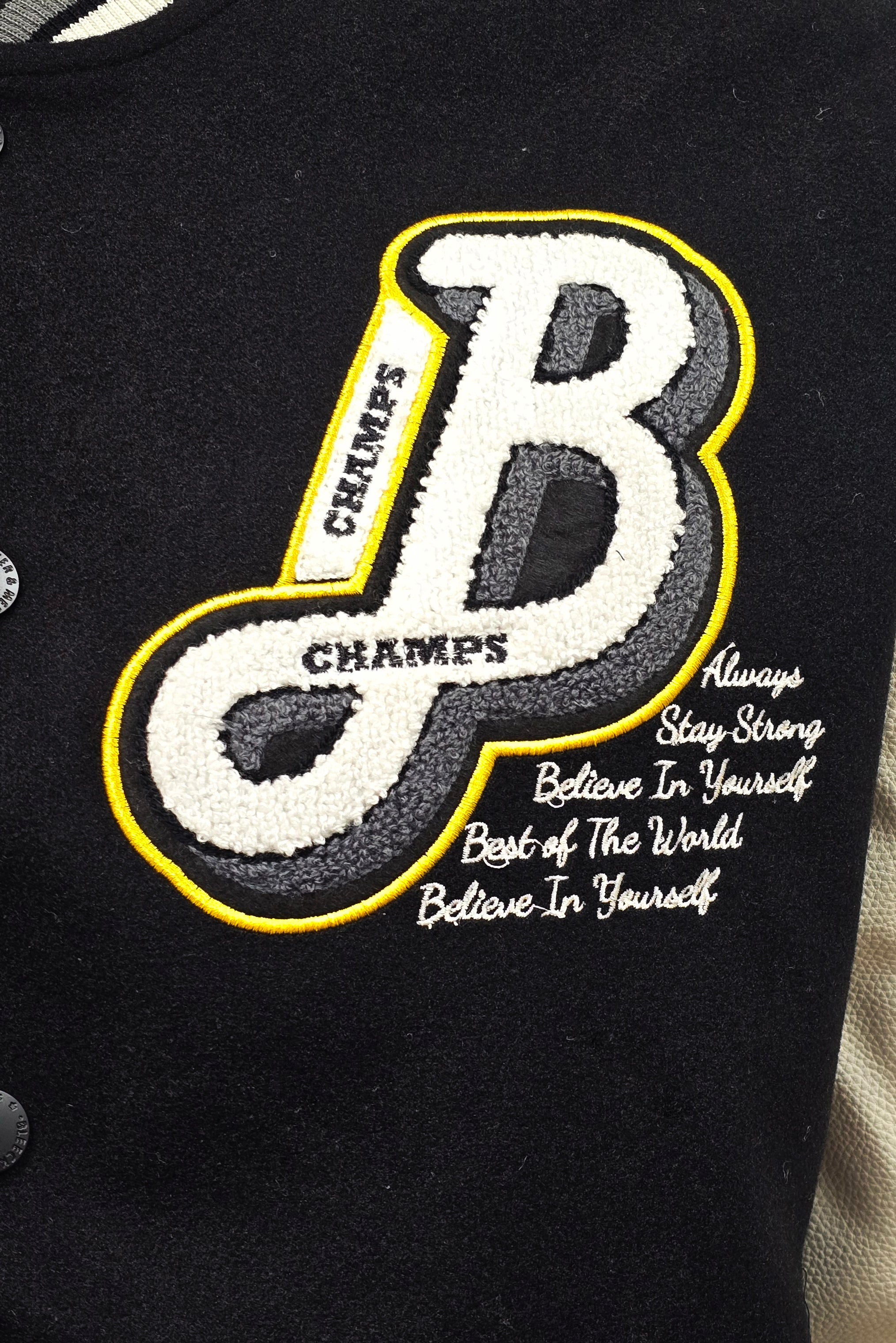 BLEECKER & MERCER MEN'S MIXED FABRIC EMBROIDERED VARSITY JACKET W/ PATCHES (BLACK)