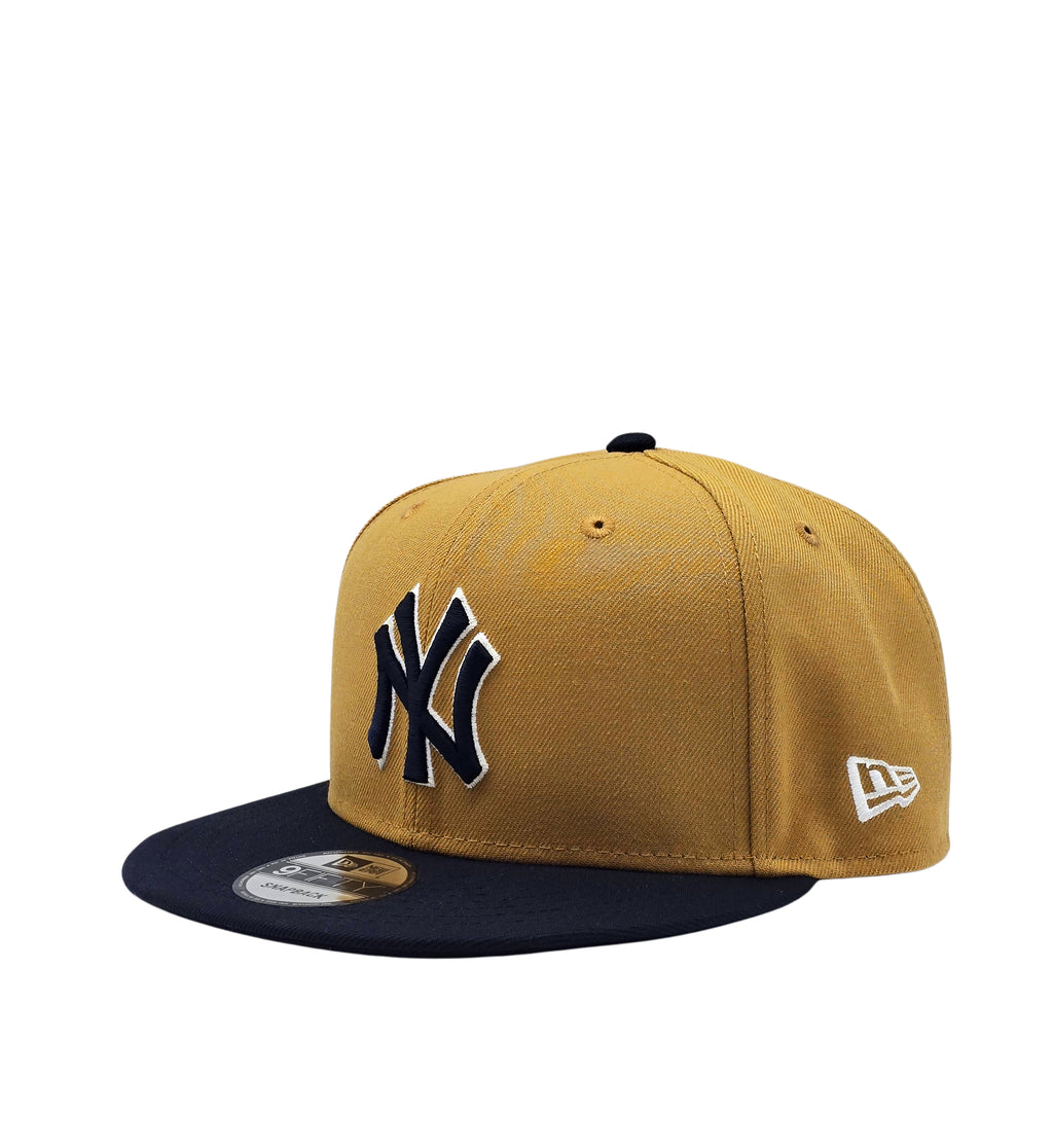 NEW ERA 9FIFTY NEW YORK YANKEES 1999 WORLD SERIES CAMEL/NAVY SNAPBACK HAT