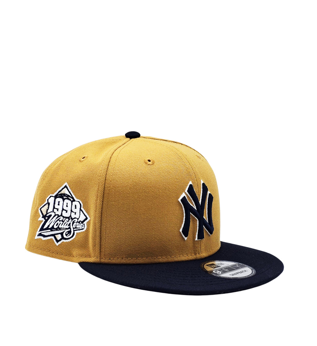 NEW ERA 9FIFTY NEW YORK YANKEES 1999 WORLD SERIES CAMEL/NAVY SNAPBACK HAT