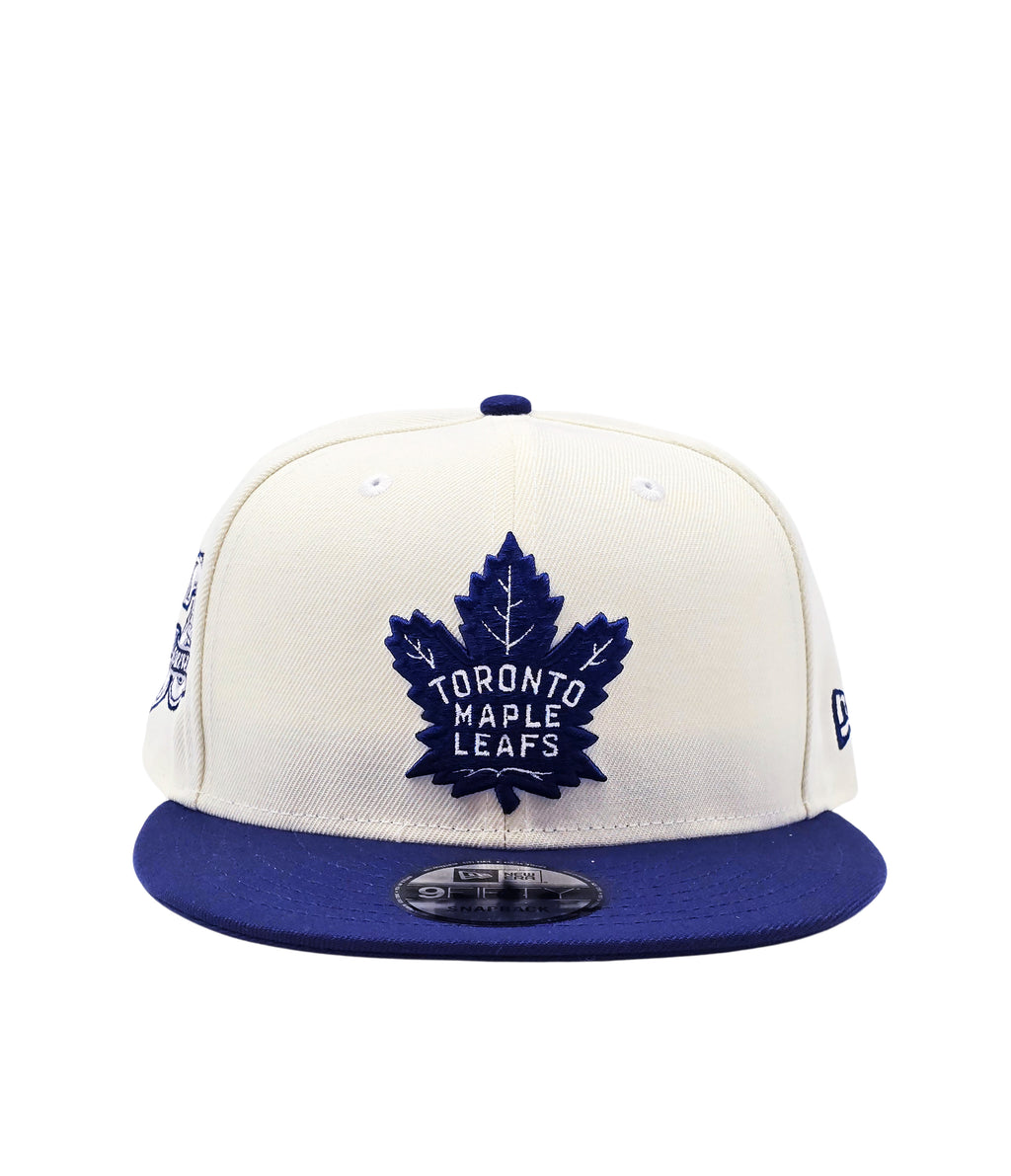 NEW ERA 9FIFTY NHL 75 FOREVER TORONTO MAPLE LEAFS CREAM/NAVY SNAPBACK HAT