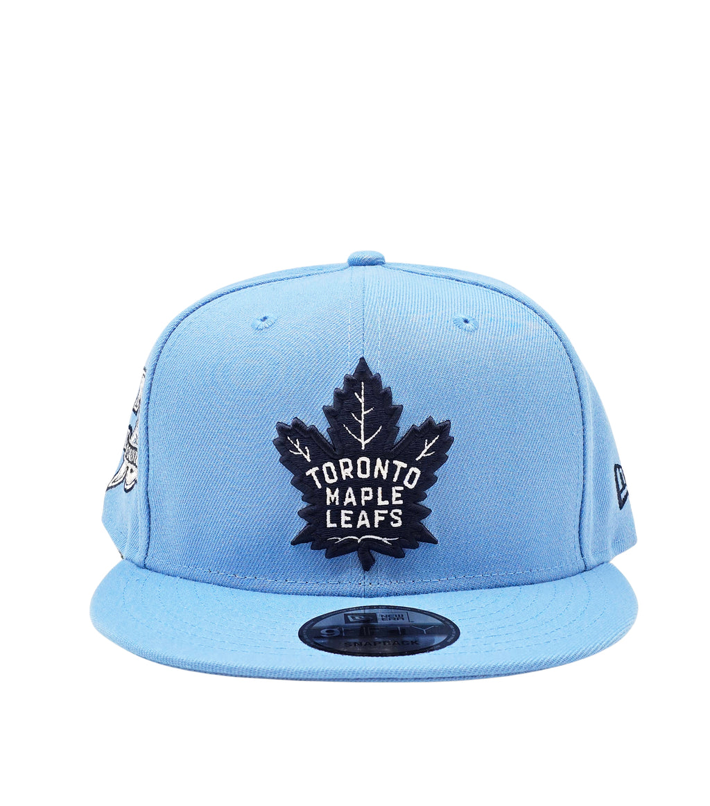 NEW ERA 9FIFTY NHL 75 FOREVER TORONTO MAPLE LEAFS SKY BLUE SNAPBACK HAT