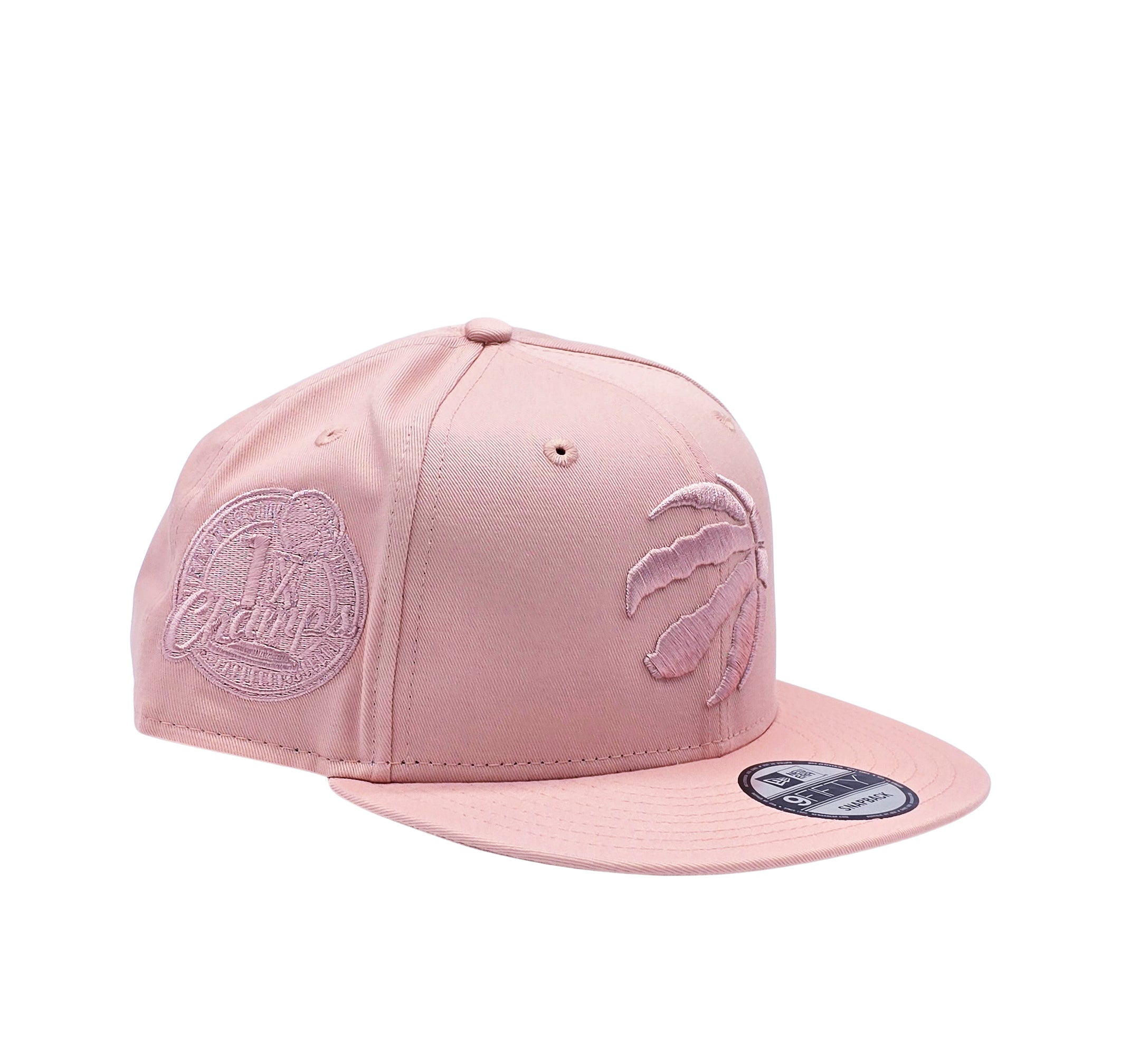 NEW ERA 9FIFTY NBA TORONTO RAPTORS 1X CHAMPS BLUSH PINK SNAPBACK HAT