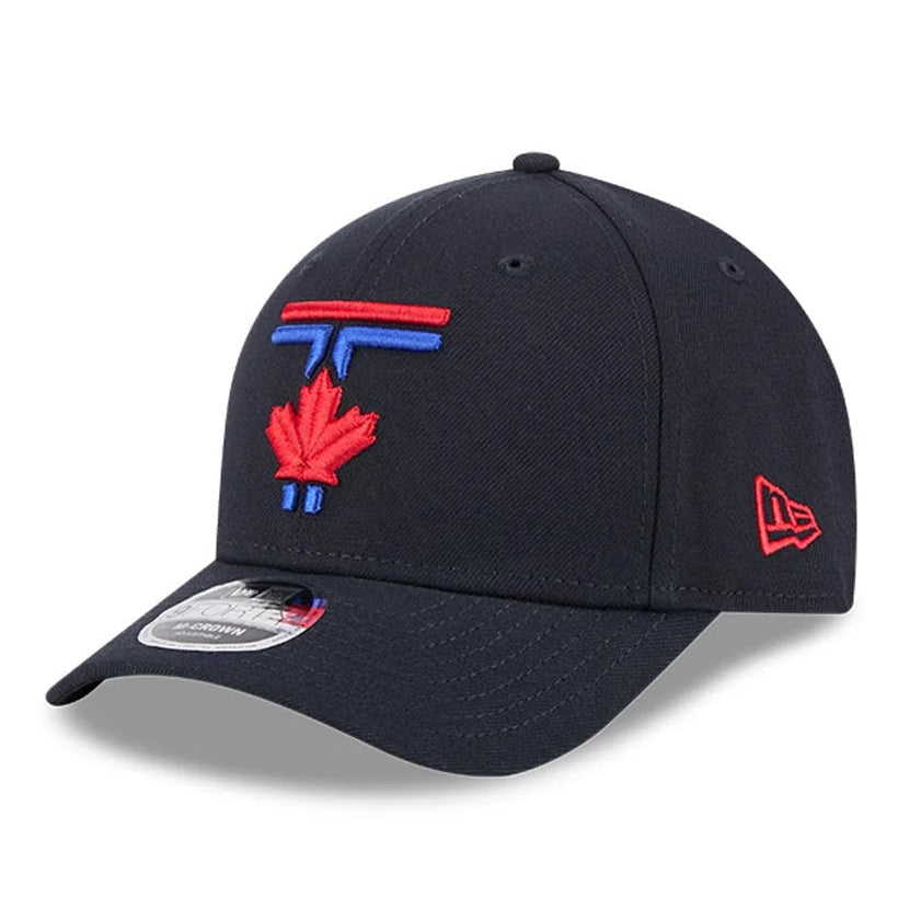 A navy blue baseball cap featuring a red maple leaf and red and blue 'T' logo on the front, with a red New Era logo on the side, set against a plain white background.