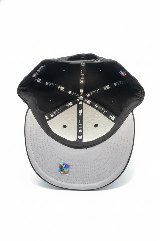 MEN'S 950 NEW ERA TORONTO RAPTORS CHAMPIONS BLACK SNAPBACK HAT