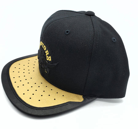 TORONTO RAPTORS OLD LOGO GOLD WITH BLACK SNAPBACK HAT